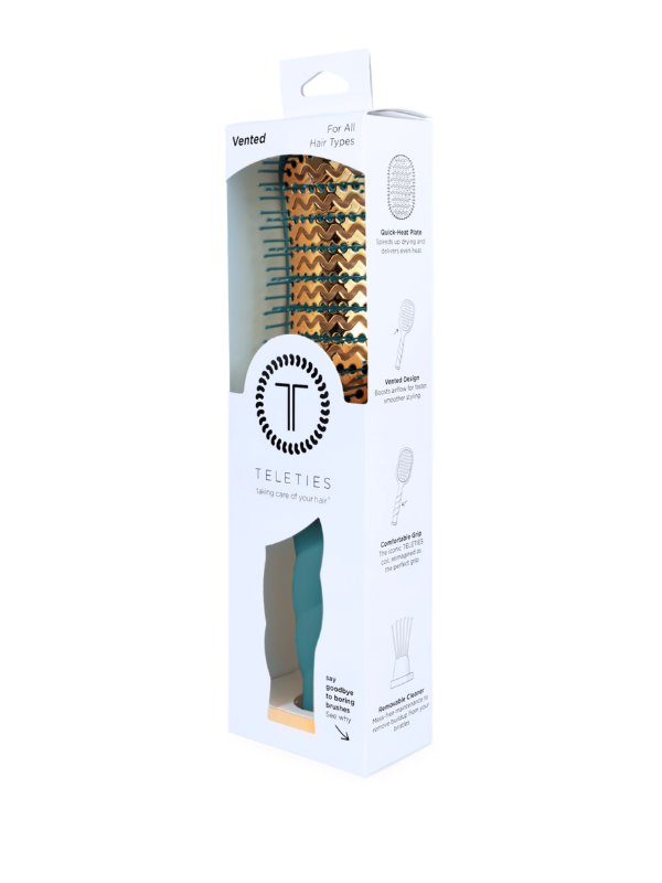 Teleties Vented hair brush in its original white packaging box, featuring a patterned bristle head and a teal handle.