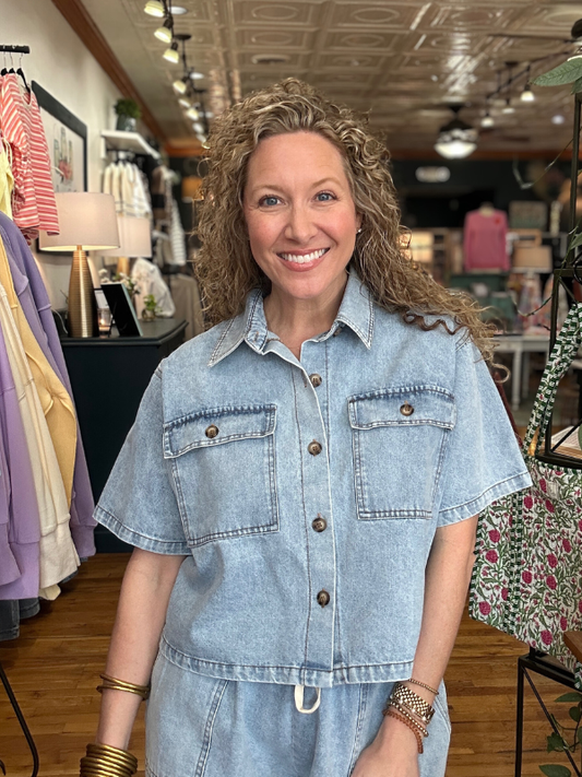 Woman wearing a denim outfit in a clothing store