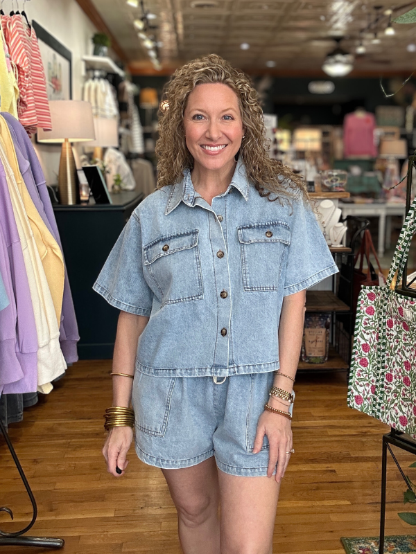 Woman wearing a denim outfit in a clothing store