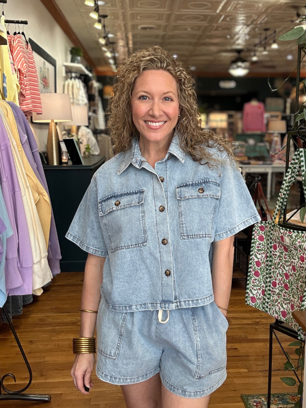 Woman wearing a denim outfit in a clothing store