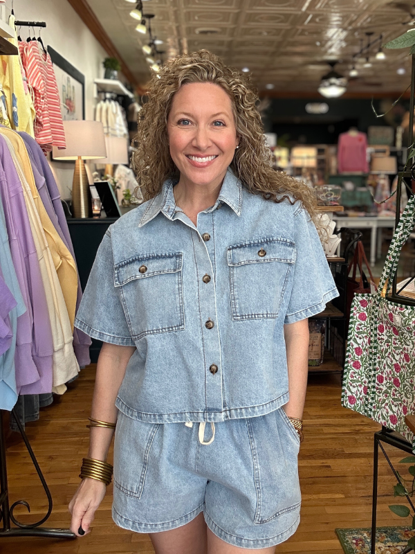 Woman wearing a denim outfit in a clothing store