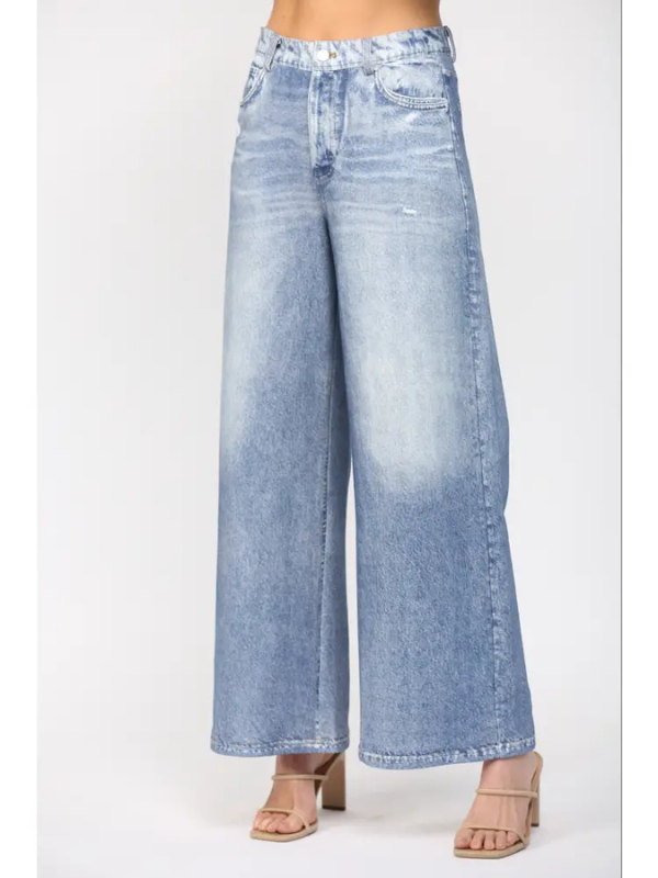 Light blue wide-leg jeans on a white background