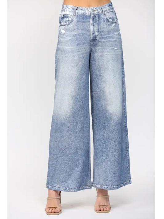 Wide-leg jeans on a white background
