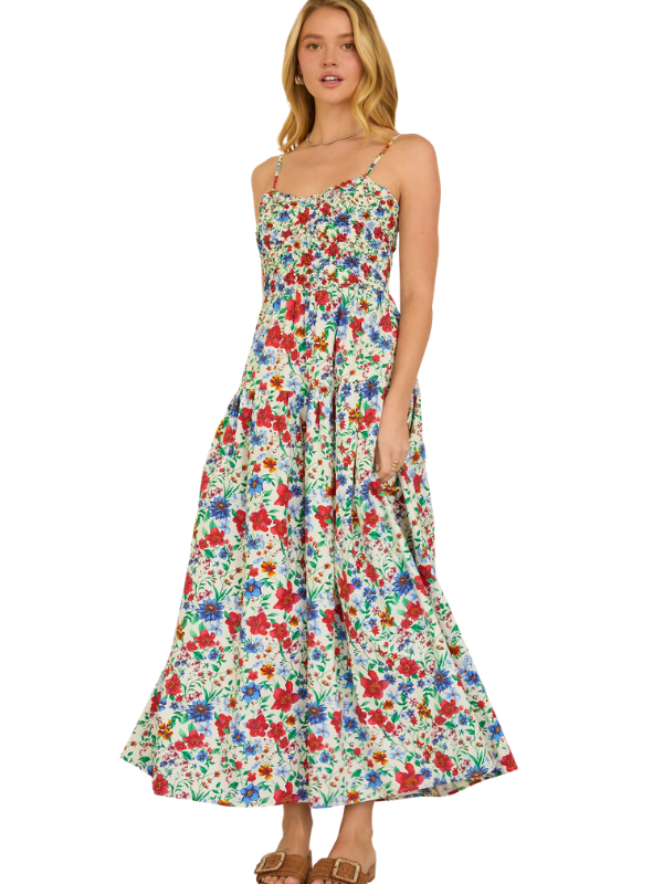 Woman wearing a floral dress on a white background